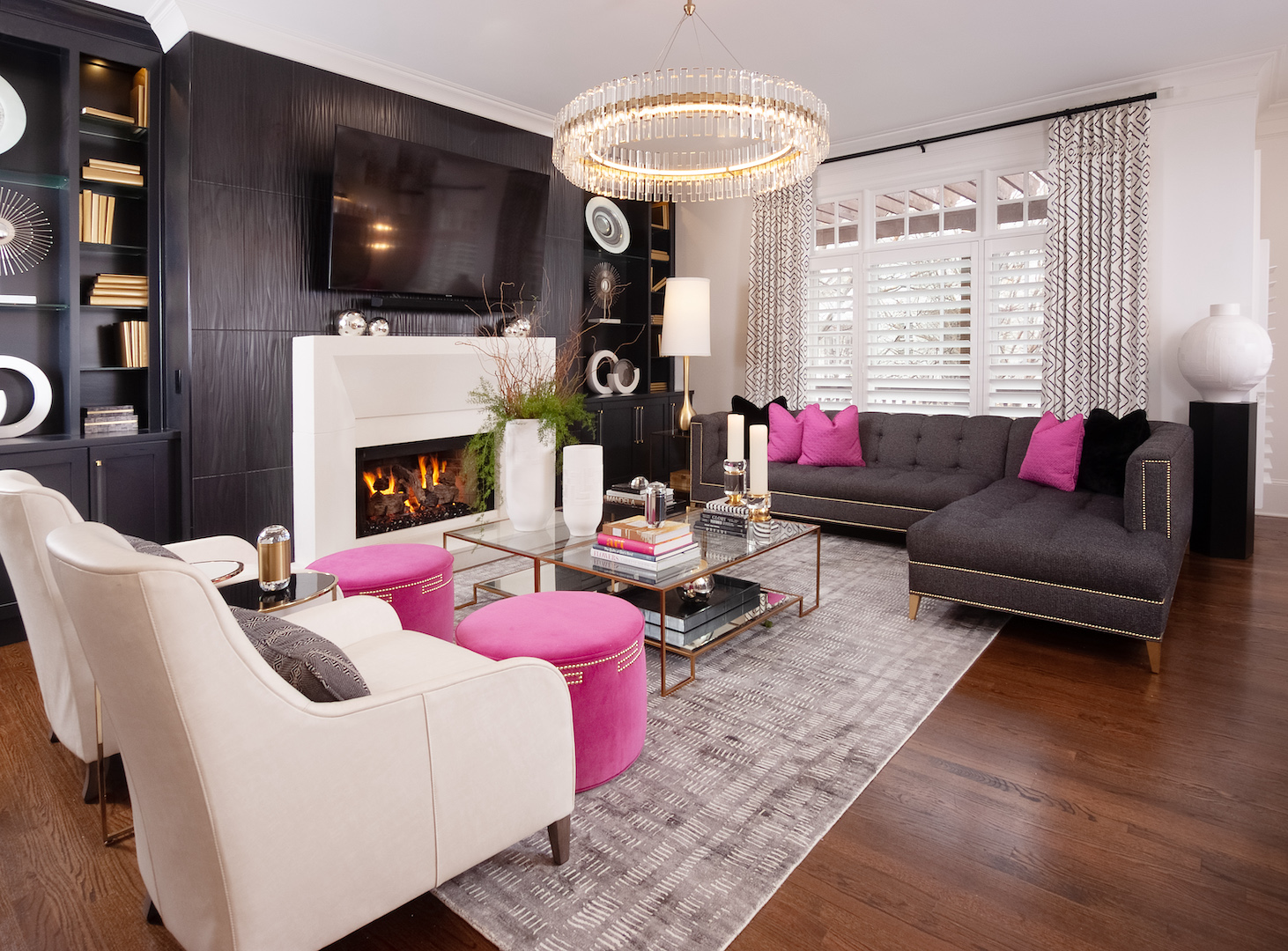 pink accented black and white living room