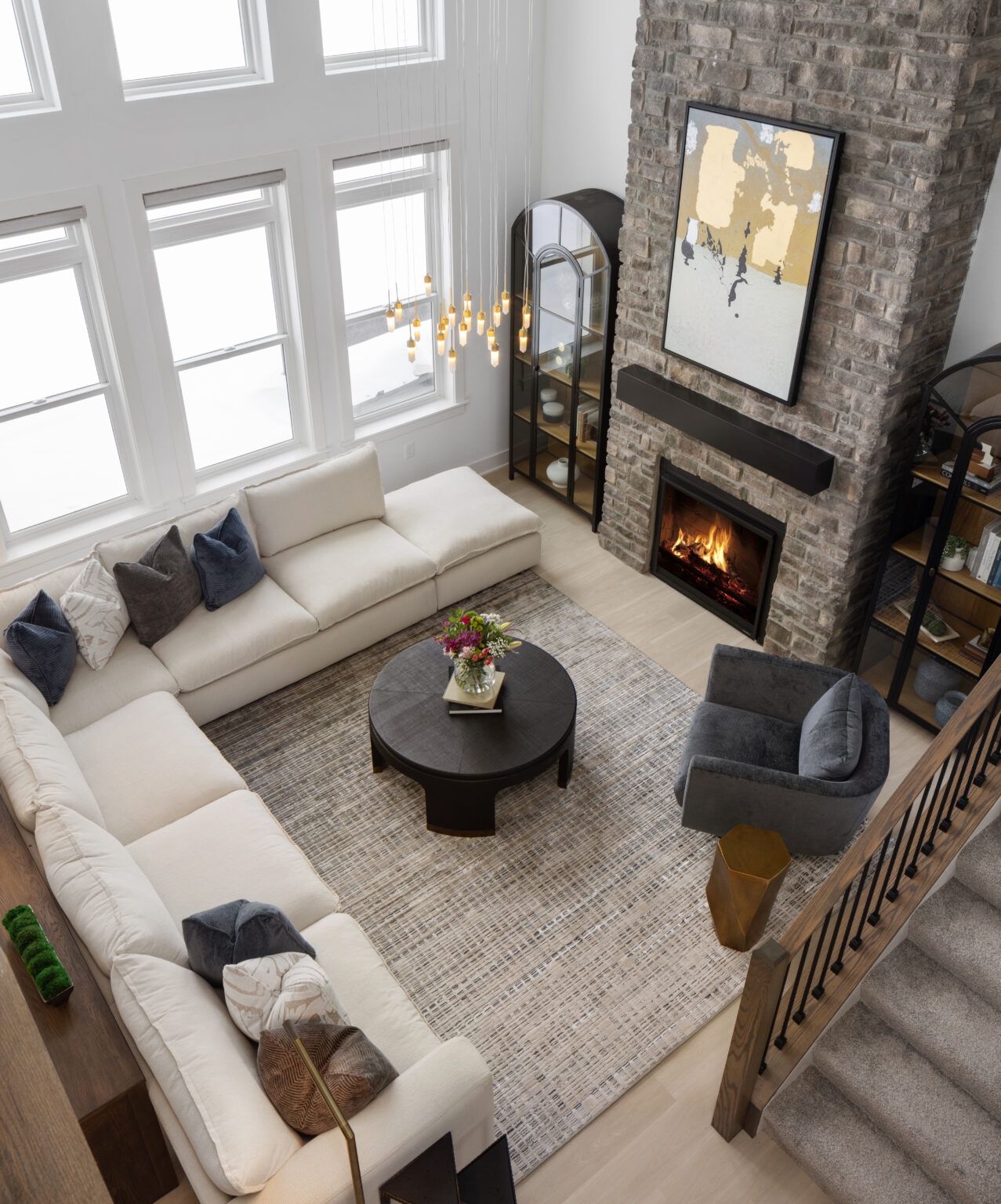 Warm living room with stone fireplace
